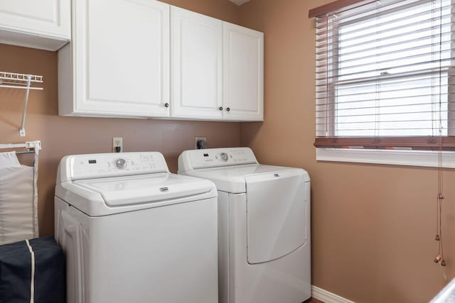 1394 Bee Creek Rd, Branson, MO 65616 - laundry area with independent washer and dryer and cabinet space
