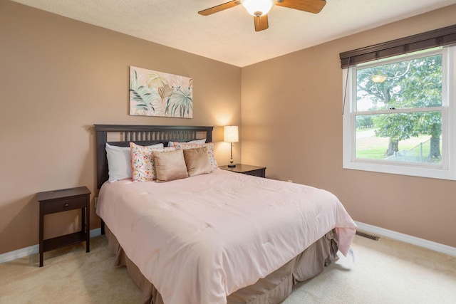 1394 Bee Creek Rd, Branson, MO 65616 - bedroom with carpet flooring, baseboards, and a ceiling fan