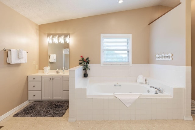 1394 Bee Creek Rd, Branson, MO 65616 - full bathroom with vanity, a bath, tile patterned flooring, vaulted ceiling, and baseboards