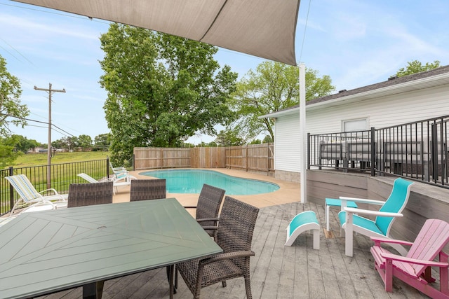 1394 Bee Creek Rd, Branson, MO 65616 - view of swimming pool featuring a fenced backyard, outdoor dining space, and a deck