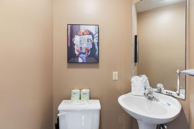1394 Bee Creek Rd, Branson, MO 65616 - half bath featuring a sink and toilet