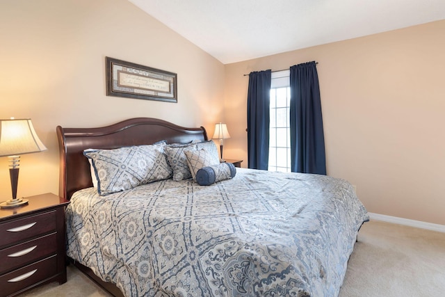 1394 Bee Creek Rd, Branson, MO 65616 - bedroom featuring light carpet, lofted ceiling, and baseboards