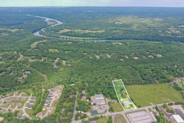 1394 Bee Creek Rd, Branson, MO 65616 - aerial view of property and surrounding area featuring property parcel outlined, a heavily wooded area, and a nearby body of water