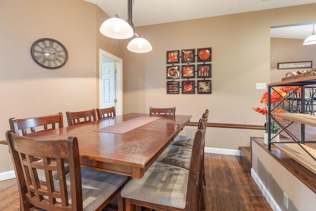 1394 Bee Creek Rd, Branson, MO 65616 - dining space featuring dark wood-style floors and baseboards
