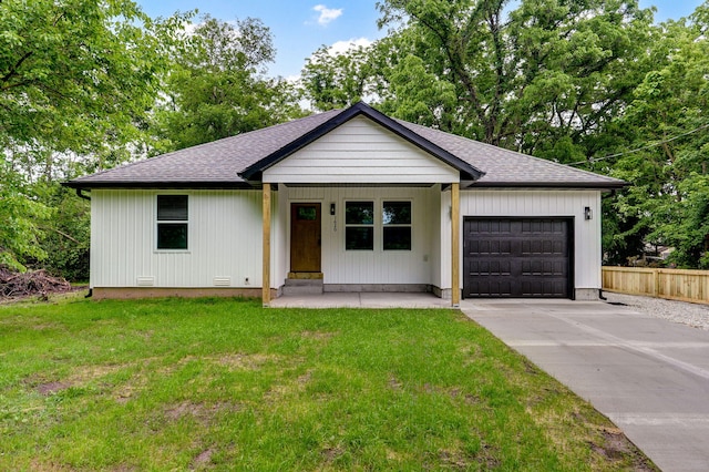 1620 N Texas Ave, Springfield, MO 65803 - view of front of property featuring a garage, driveway, roof with shingles, and covered porch