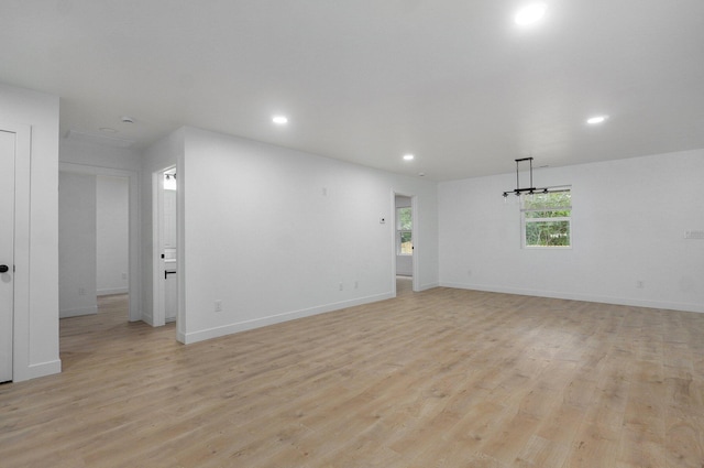 1620 N Texas Ave, Springfield, MO 65803 - empty room featuring light wood-type flooring, recessed lighting, and baseboards