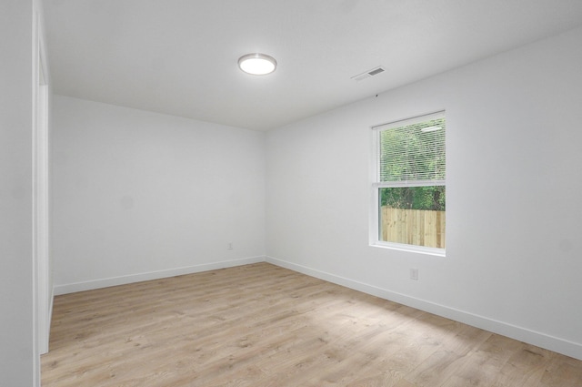 1620 N Texas Ave, Springfield, MO 65803 - spare room with light wood-type flooring and baseboards