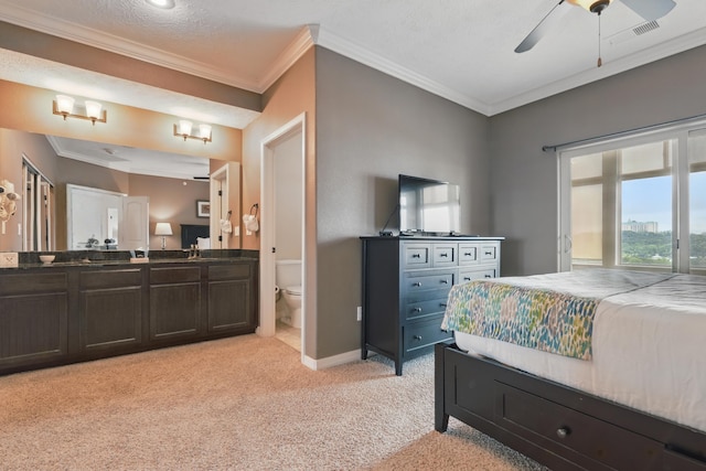 200 Majestic Dr Unit 1-208, Branson, MO 65616 - bedroom featuring light carpet, crown molding, baseboards, and ensuite bath