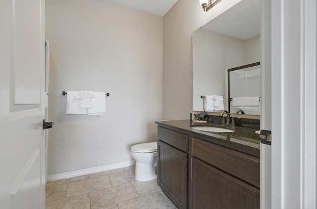 200 Majestic Dr Unit 1-208, Branson, MO 65616 - full bathroom with vanity, toilet, baseboards, and tile patterned floors