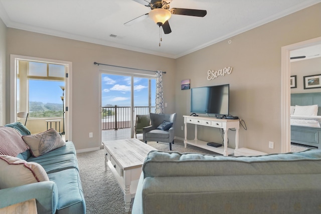 200 Majestic Dr Unit 1-208, Branson, MO 65616 - carpeted living area featuring plenty of natural light, crown molding, a ceiling fan, and baseboards