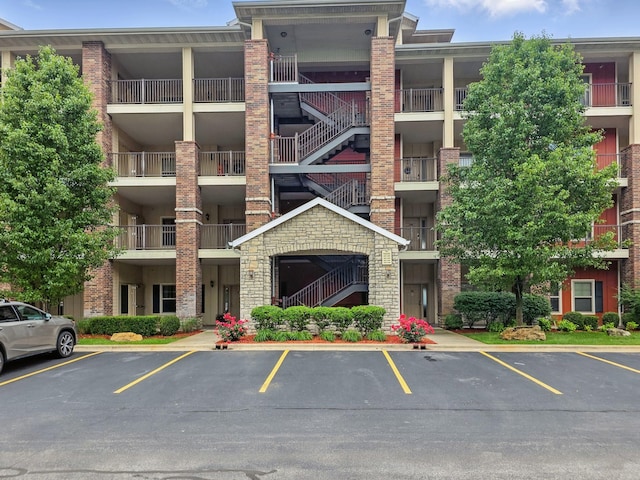 200 Majestic Dr Unit 1-208, Branson, MO 65616 - view of apartment building / complex featuring uncovered parking