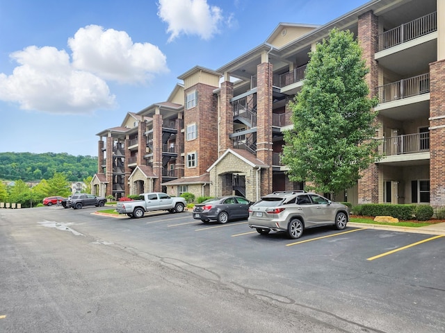 200 Majestic Dr Unit 1-208, Branson, MO 65616 - view of apartment building / complex featuring uncovered parking