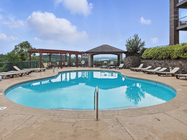 200 Majestic Dr Unit 1-208, Branson, MO 65616 - community pool with a gazebo and a patio