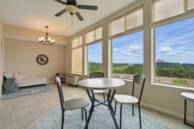 200 Majestic Dr Unit 1-208, Branson, MO 65616 - dining area with a chandelier, ceiling fan, light tile patterned floors, and baseboards