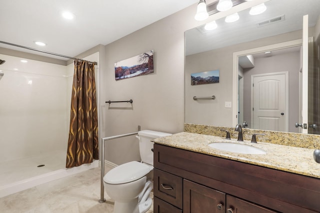 5142 S Burrows Ave, Springfield, MO 65810 - bathroom with toilet, vanity, a shower with curtain, tile patterned flooring, and recessed lighting