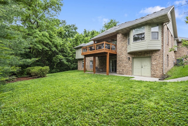 5142 S Burrows Ave, Springfield, MO 65810 - back of property with brick siding, a lawn, and a patio area