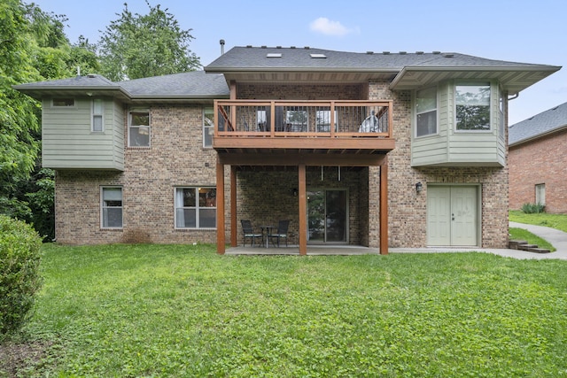 5142 S Burrows Ave, Springfield, MO 65810 - rear view of property with a yard, brick siding, and a patio