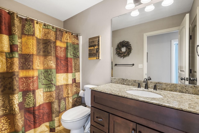 5142 S Burrows Ave, Springfield, MO 65810 - bathroom featuring toilet, vanity, and a shower with curtain