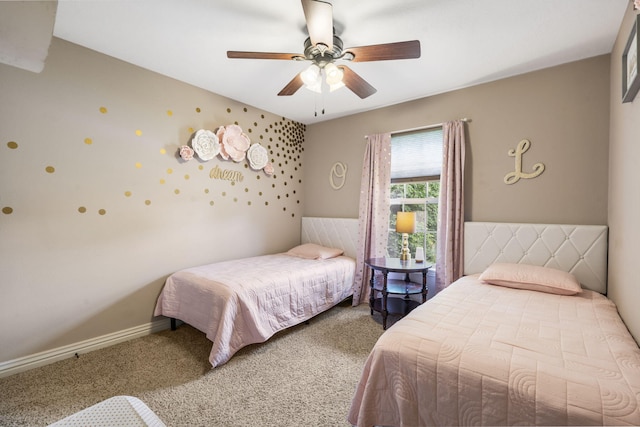 5142 S Burrows Ave, Springfield, MO 65810 - carpeted bedroom with a ceiling fan