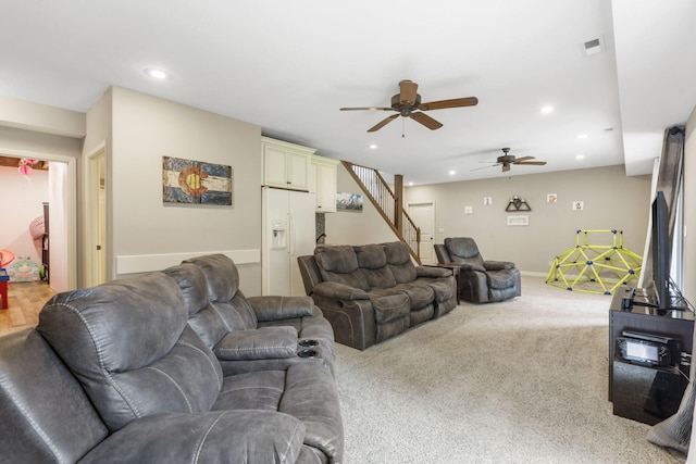 5142 S Burrows Ave, Springfield, MO 65810 - carpeted living room featuring ceiling fan, stairway, recessed lighting, and baseboards