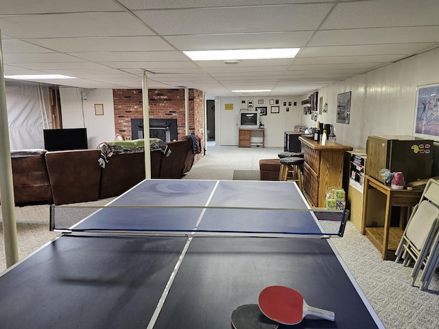 22389 Lawrence Unit 1215, Aurora, MO 65605 - recreation room with a drop ceiling, carpet floors, and a brick fireplace