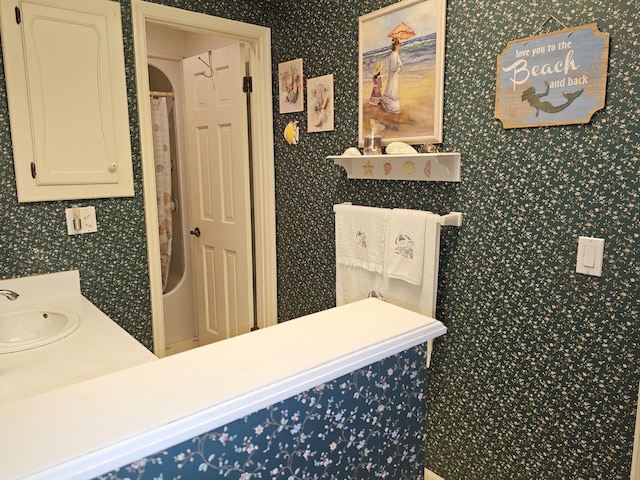 22389 Lawrence Unit 1215, Aurora, MO 65605 - full bathroom with wallpapered walls and vanity