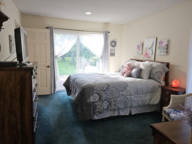 22389 Lawrence Unit 1215, Aurora, MO 65605 - bedroom featuring access to outside, dark carpet, and a textured ceiling