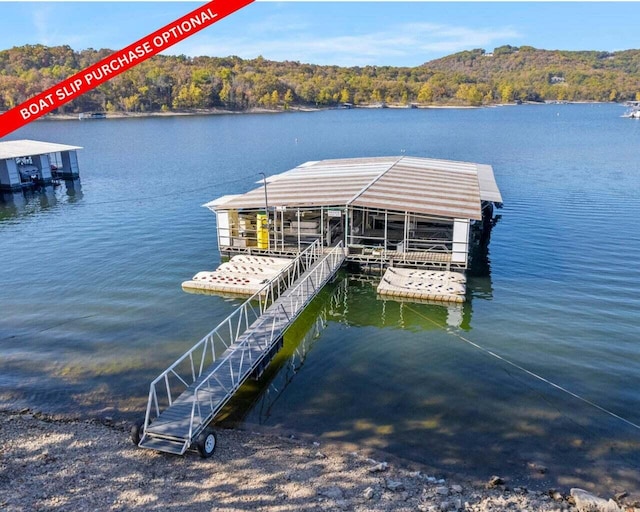 39 James River Rd, Kimberling City, MO 65686 - dock area featuring a water view, a forest view, and boat lift