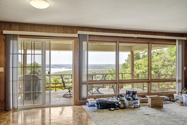 39 James River Rd, Kimberling City, MO 65686 - doorway to outside featuring healthy amount of natural light and wood walls