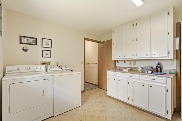 39 James River Rd, Kimberling City, MO 65686 - laundry room with washer and dryer, cabinet space, and light flooring