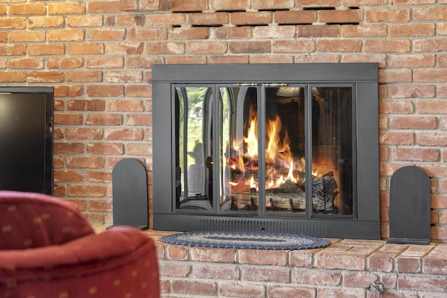 39 James River Rd, Kimberling City, MO 65686 - detailed view of a brick fireplace and brick wall