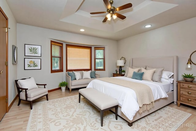 299 Regal Dr, Rogersville, MO 65742 - bedroom with recessed lighting, light wood-style flooring, a raised ceiling, and baseboards