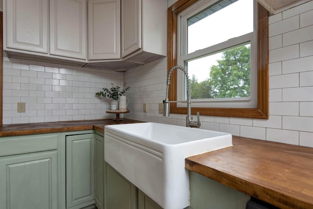 299 Regal Dr, Rogersville, MO 65742 - kitchen with wood counters, tasteful backsplash, and a sink