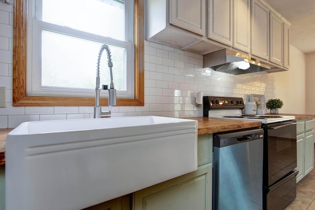 299 Regal Dr, Rogersville, MO 65742 - kitchen with range with electric cooktop, dishwasher, under cabinet range hood, a sink, and backsplash