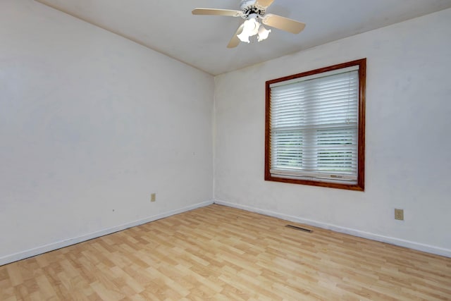 299 Regal Dr, Rogersville, MO 65742 - unfurnished room with wood finished floors, baseboards, and ceiling fan