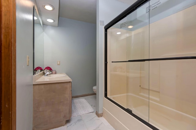 299 Regal Dr, Rogersville, MO 65742 - bathroom with marble look tiles, toilet, vanity, bath / shower combo with glass door, and recessed lighting