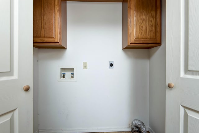 299 Regal Dr, Rogersville, MO 65742 - laundry room featuring electric dryer hookup, cabinet space, and washer hookup