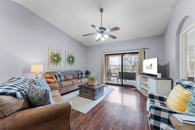 350 S Wildwood Dr Unit B-11, Branson, MO 65616 - living area with arched walkways, lofted ceiling, wood finished floors, ceiling fan, and a textured ceiling