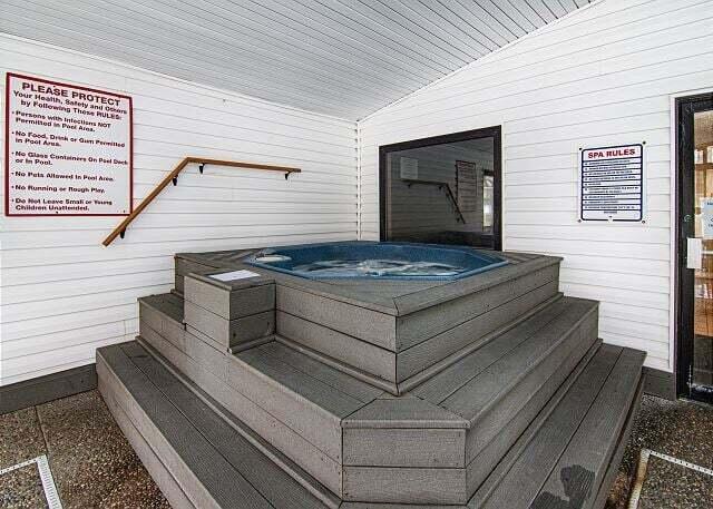 350 S Wildwood Dr Unit B-11, Branson, MO 65616 - wooden terrace featuring a hot tub