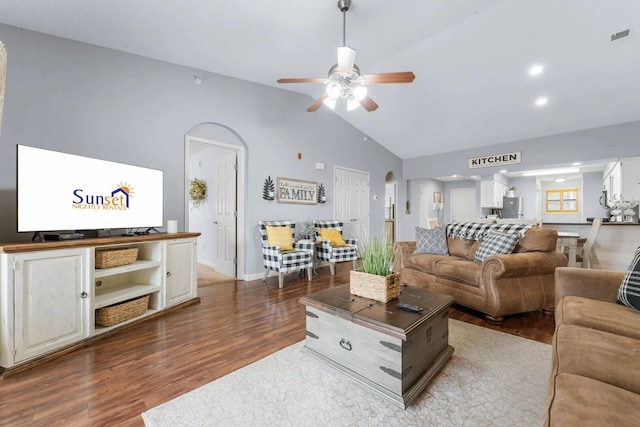 350 S Wildwood Dr Unit B-11, Branson, MO 65616 - living area with dark wood-style floors, lofted ceiling, arched walkways, a ceiling fan, and recessed lighting