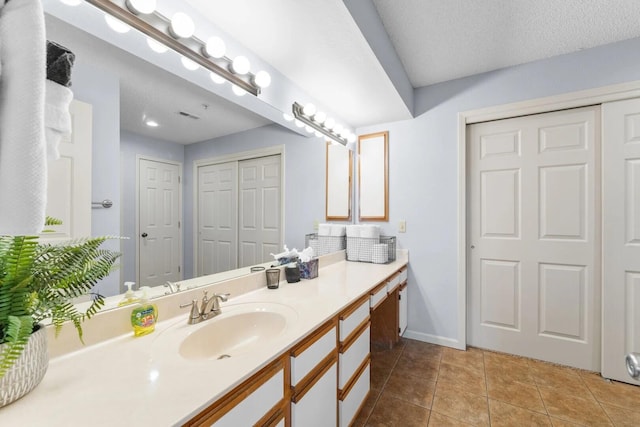 350 S Wildwood Dr Unit B-11, Branson, MO 65616 - bathroom with vanity, tile patterned floors, and baseboards