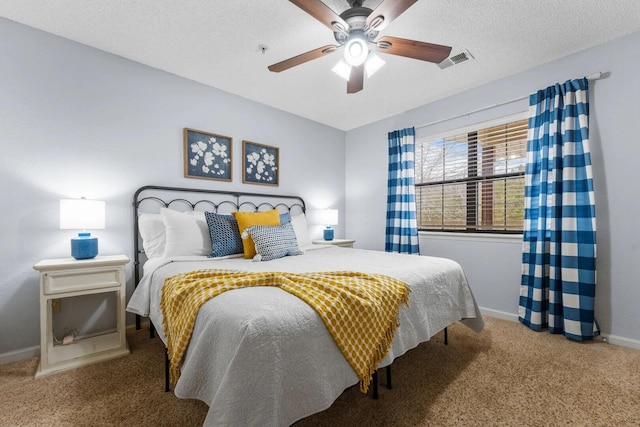 350 S Wildwood Dr Unit B-11, Branson, MO 65616 - bedroom with carpet, baseboards, a ceiling fan, and a textured ceiling
