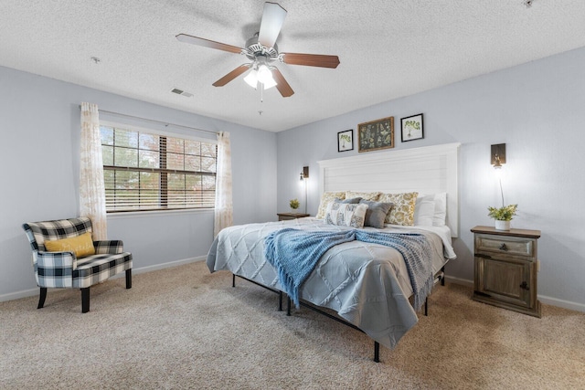 350 S Wildwood Dr Unit B-11, Branson, MO 65616 - bedroom featuring carpet flooring, a textured ceiling, ceiling fan, and baseboards