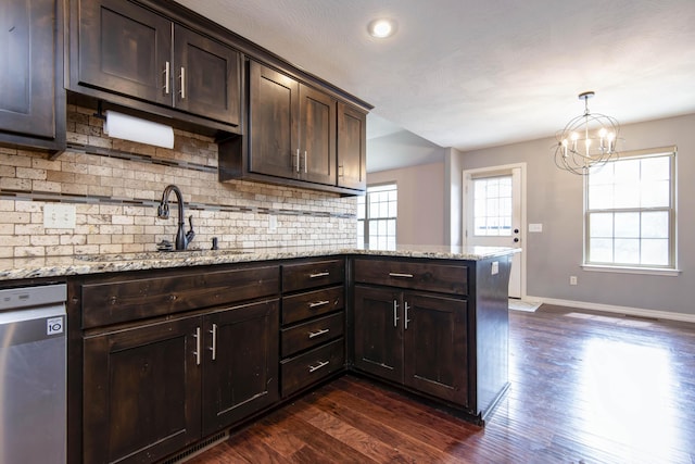 5048 S Fieldstone Rd, Battlefield, MO 65619 - kitchen with a sink, stainless steel dishwasher, tasteful backsplash, dark brown cabinetry, and dark wood-style flooring