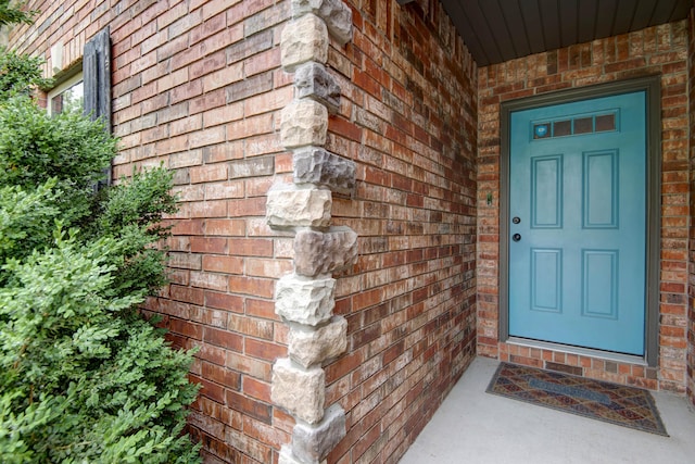 5048 S Fieldstone Rd, Battlefield, MO 65619 - doorway to property featuring brick siding