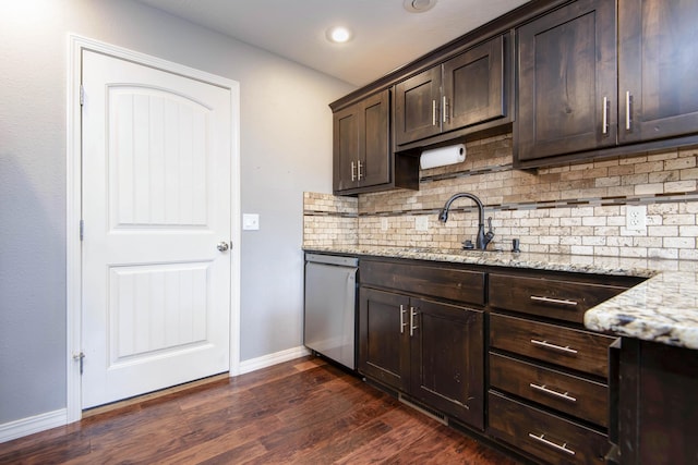 5048 S Fieldstone Rd, Battlefield, MO 65619 - kitchen with a sink, stainless steel dishwasher, backsplash, dark brown cabinetry, and baseboards