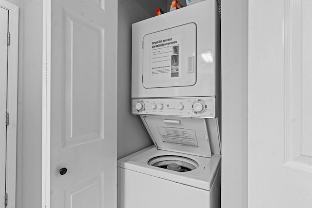 200 Golf View Dr Unit 3, Branson, MO 65616 - washroom featuring stacked washer / drying machine