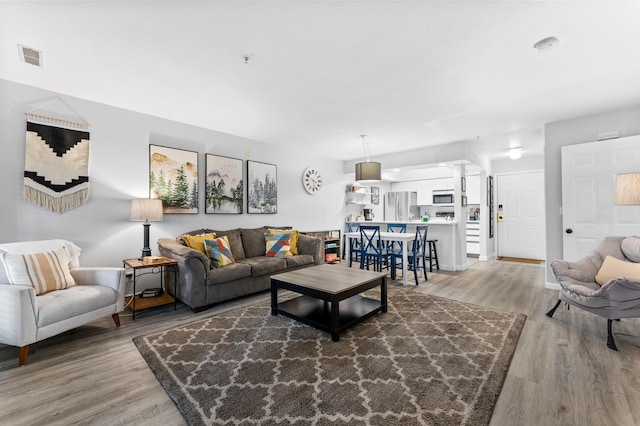 200 Golf View Dr Unit 3, Branson, MO 65616 - living area featuring light wood finished floors and baseboards
