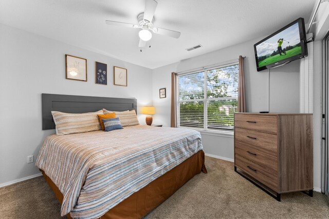 200 Golf View Dr Unit 3, Branson, MO 65616 - bedroom featuring light carpet, baseboards, and a ceiling fan