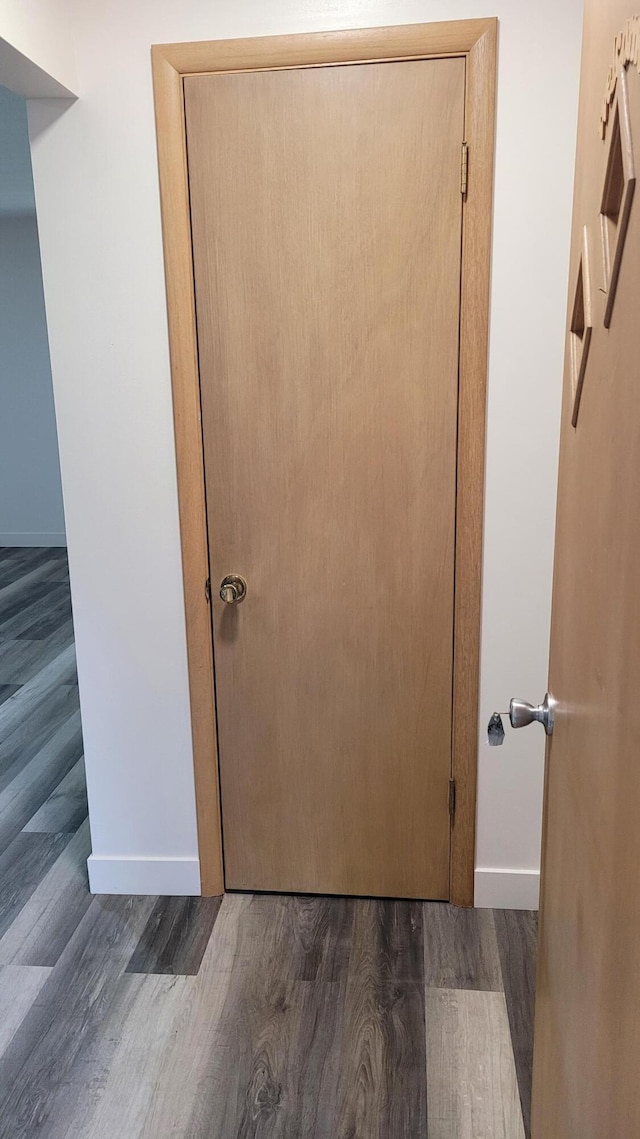 415 N Locust St, Marshfield, MO 65706 - detailed view of wood finished floors and baseboards